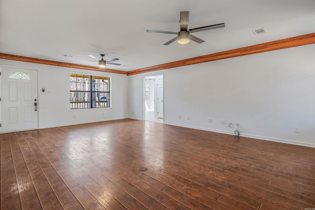 unfurnished living room featuring dark wood finished floors, visible vents, a ceiling fan, and baseboards