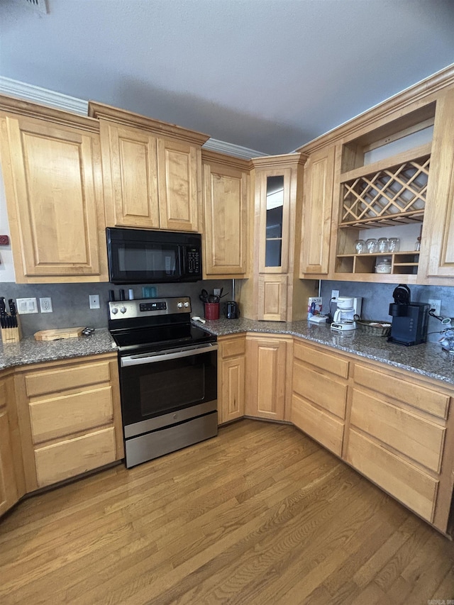 kitchen featuring light wood-type flooring, light brown cabinetry, open shelves, stainless steel electric stove, and black microwave