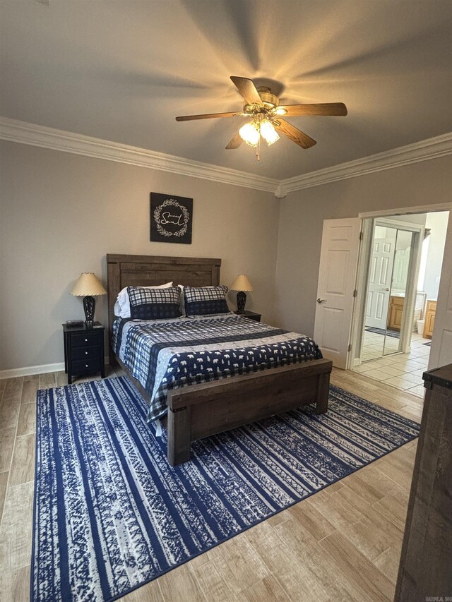 bedroom featuring a ceiling fan, wood finished floors, baseboards, and ornamental molding