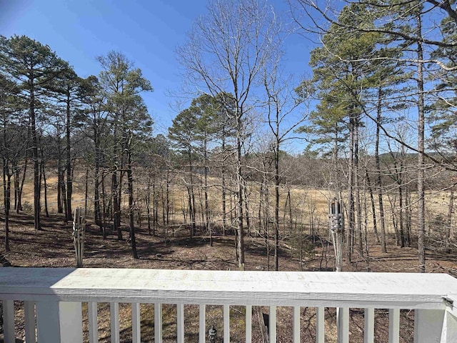 view of yard with a balcony