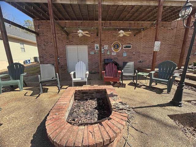 view of patio / terrace featuring ceiling fan