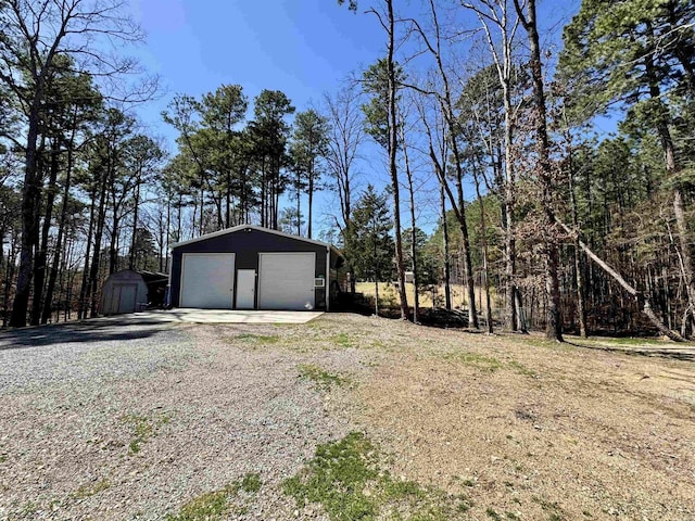 detached garage with a shed