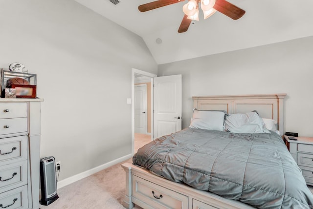 bedroom with visible vents, baseboards, vaulted ceiling, light carpet, and a ceiling fan