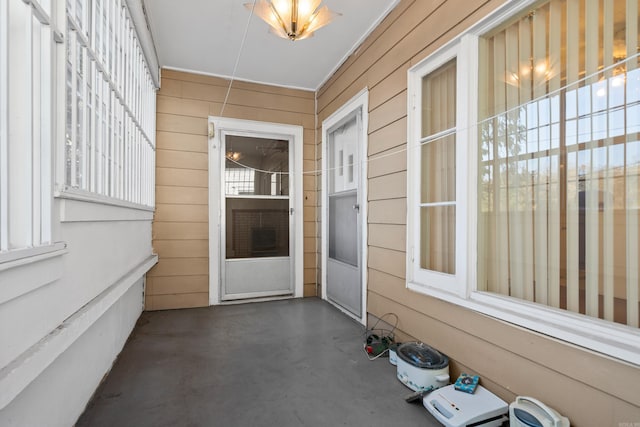 doorway to property featuring a patio area