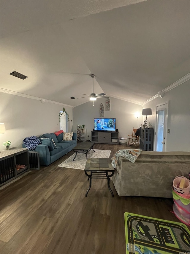 living room with visible vents, ornamental molding, a ceiling fan, wood finished floors, and lofted ceiling