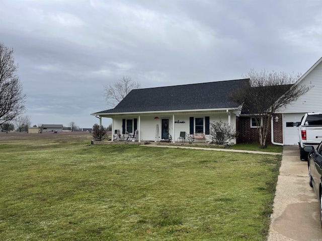 single story home with a front yard, covered porch, and a shingled roof