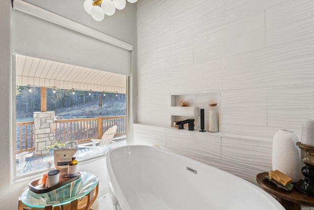 full bathroom featuring a freestanding bath