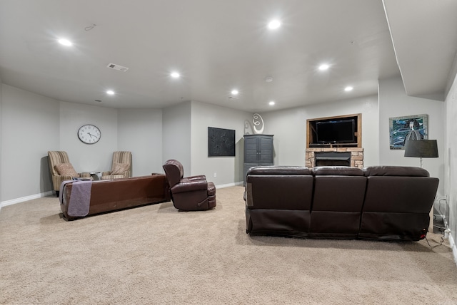 carpeted living area with visible vents, recessed lighting, and baseboards