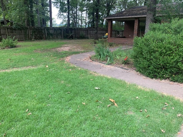 view of yard featuring fence