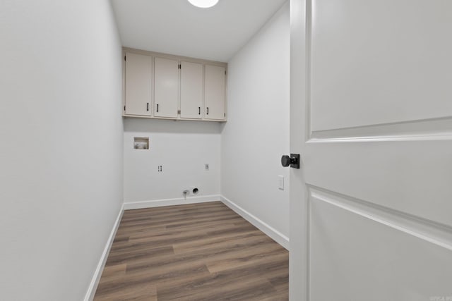 laundry area featuring washer hookup, cabinet space, baseboards, and hookup for an electric dryer