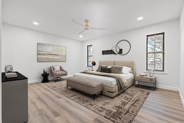 bedroom featuring recessed lighting, baseboards, and wood finished floors