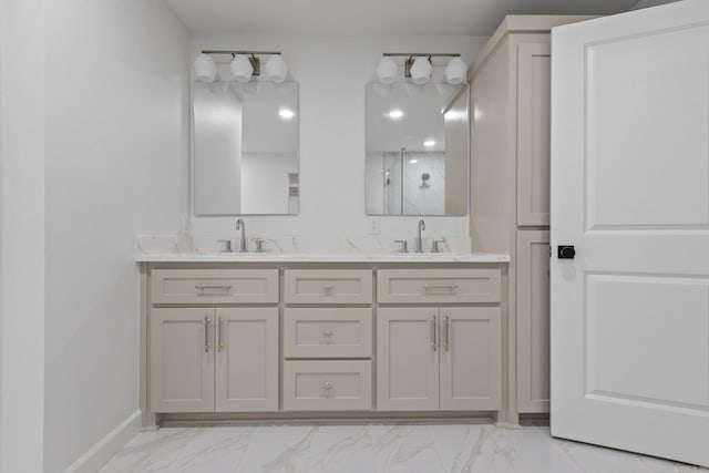 full bathroom featuring a sink, marble finish floor, and double vanity