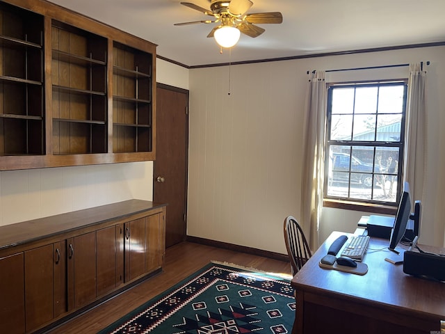 office with dark wood finished floors, baseboards, ceiling fan, and ornamental molding