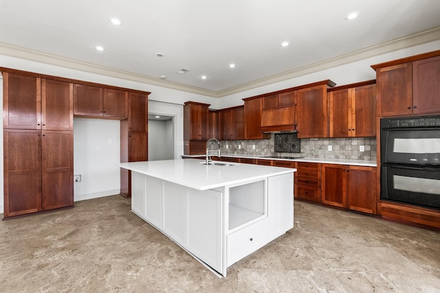 kitchen with backsplash, black appliances, light countertops, and a sink