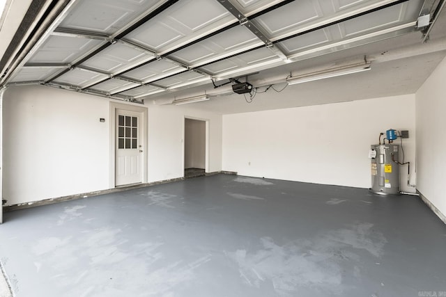 garage featuring water heater and a garage door opener