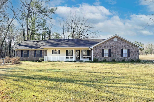 ranch-style home with brick siding, covered porch, and a front lawn