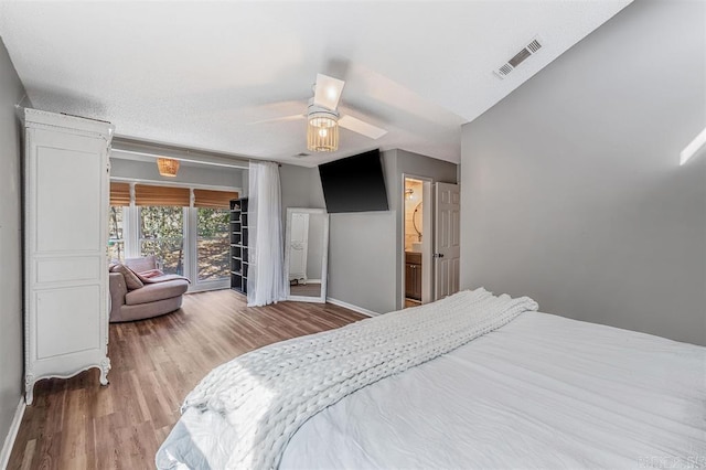 bedroom featuring wood finished floors, baseboards, visible vents, ceiling fan, and access to exterior