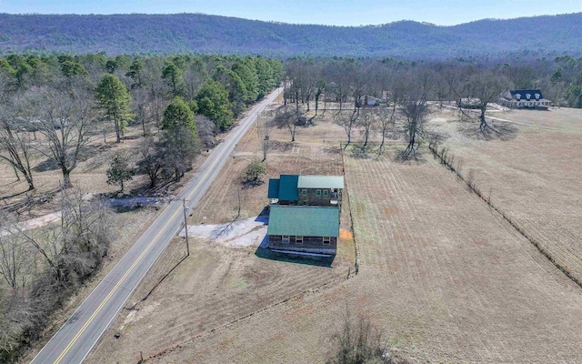 drone / aerial view with a rural view, a mountain view, and a forest view