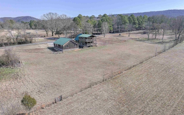 drone / aerial view featuring a rural view and a mountain view