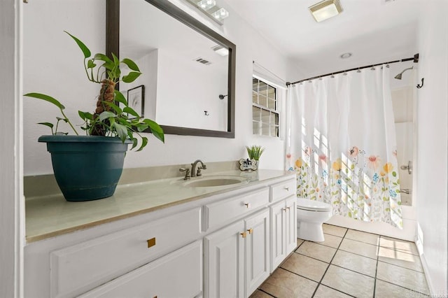 bathroom with tile patterned floors, visible vents, toilet, shower / bath combo, and vanity