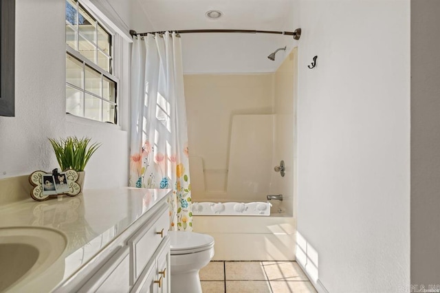 full bathroom with tile patterned floors, vanity, toilet, and shower / tub combo with curtain