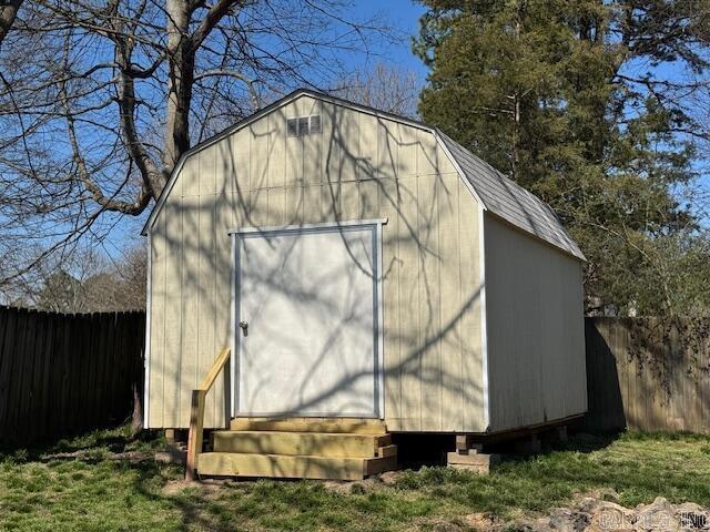 view of shed featuring a fenced backyard