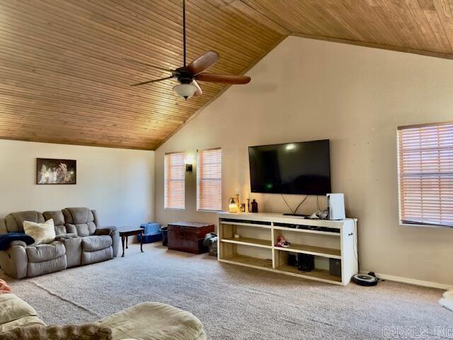 living area featuring baseboards, high vaulted ceiling, ceiling fan, wooden ceiling, and carpet flooring