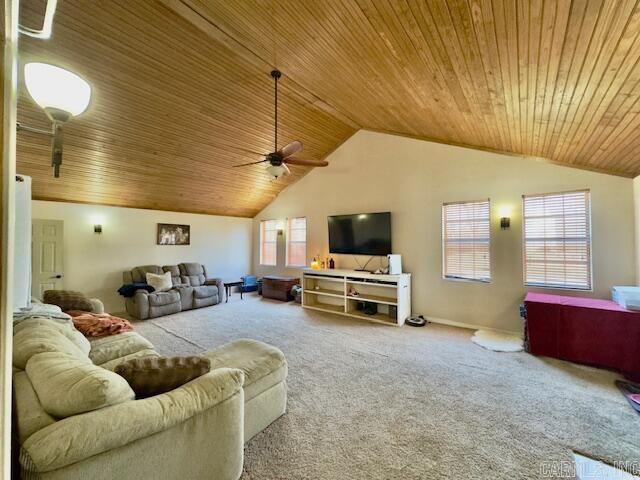 living area featuring ceiling fan, carpet floors, high vaulted ceiling, and wooden ceiling