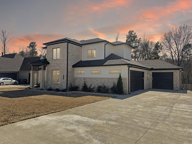 view of front of house featuring a garage and driveway