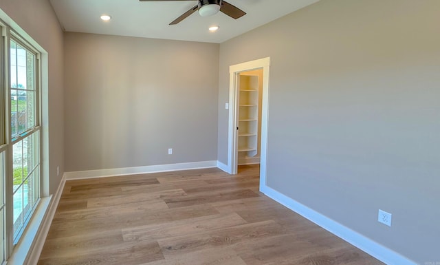 1275 Acuff Ln, Conway, AR 72034 - spare room featuring recessed lighting, light wood-style flooring, baseboards, and a ceiling fan
