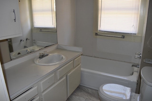 full bath featuring toilet, marble finish floor, and vanity