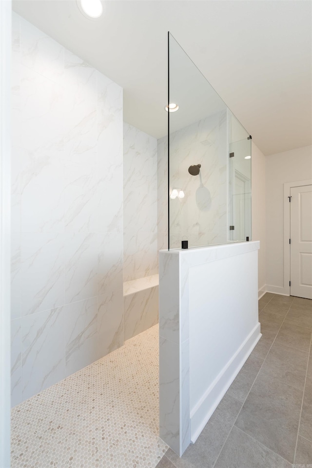 bathroom with tile patterned flooring, recessed lighting, and a walk in shower