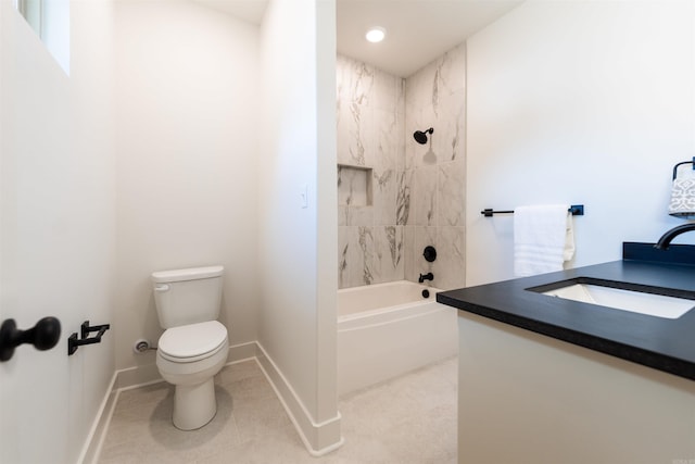 bathroom featuring tile patterned floors, baseboards, toilet, and shower / washtub combination