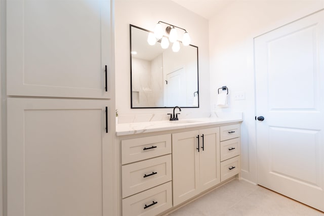 bathroom featuring vanity and tile patterned flooring