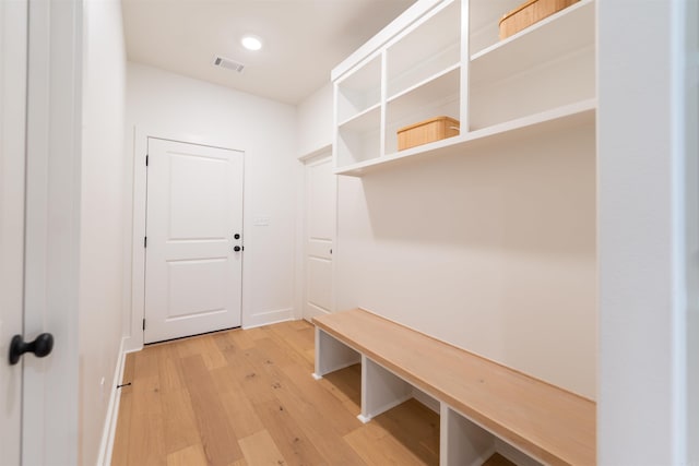 mudroom with visible vents and light wood-style floors