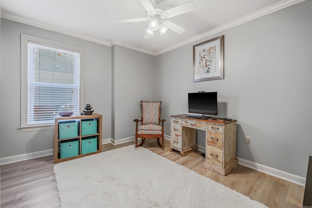 sitting room with light wood-style flooring and baseboards