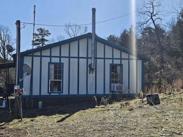 view of property exterior with cooling unit