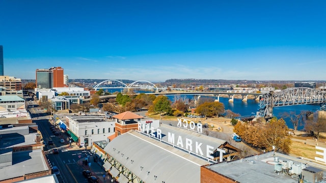 bird's eye view featuring a water view and a view of city