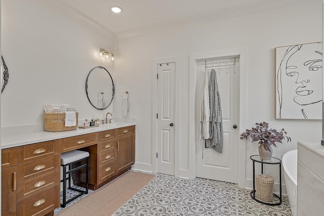 full bath with a soaking tub and vanity