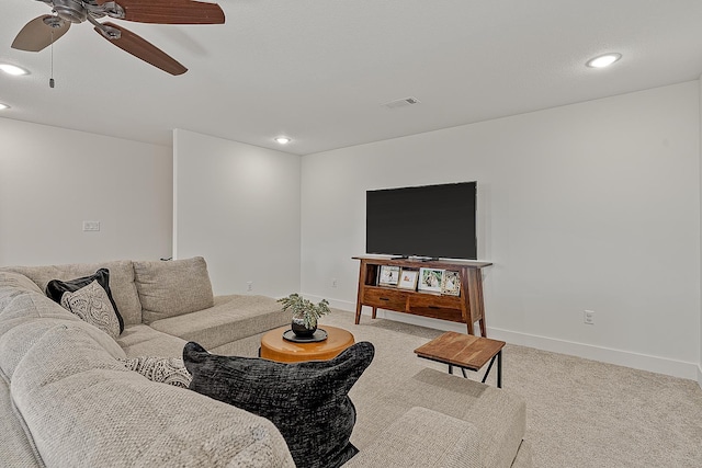 carpeted living area featuring visible vents, recessed lighting, and baseboards