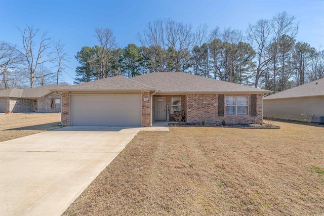 ranch-style house featuring a front lawn, concrete driveway, brick siding, and a garage