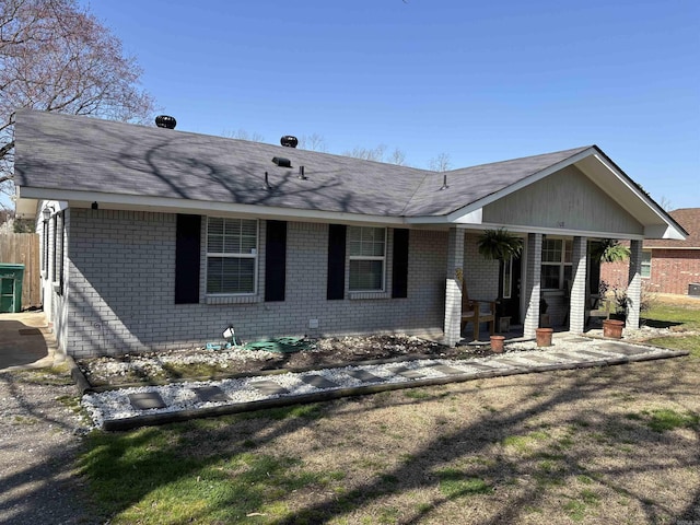 single story home with brick siding