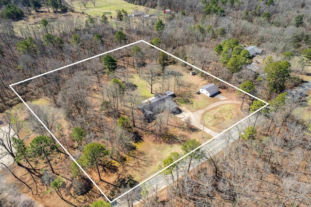 birds eye view of property with a rural view