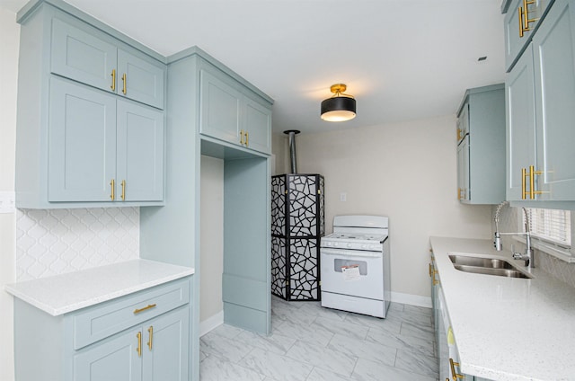 kitchen with a sink, white range with gas cooktop, marble finish floor, and light countertops