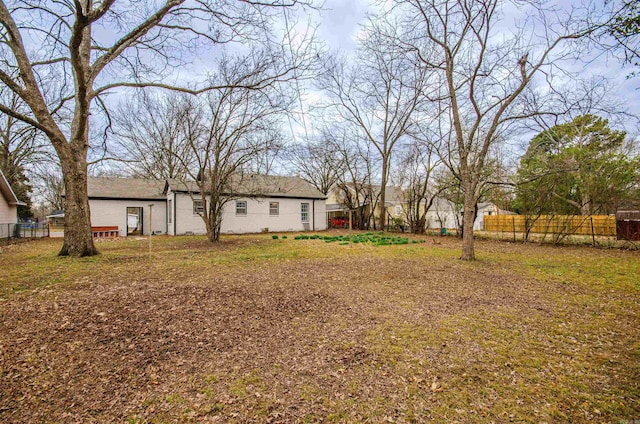 view of yard with fence