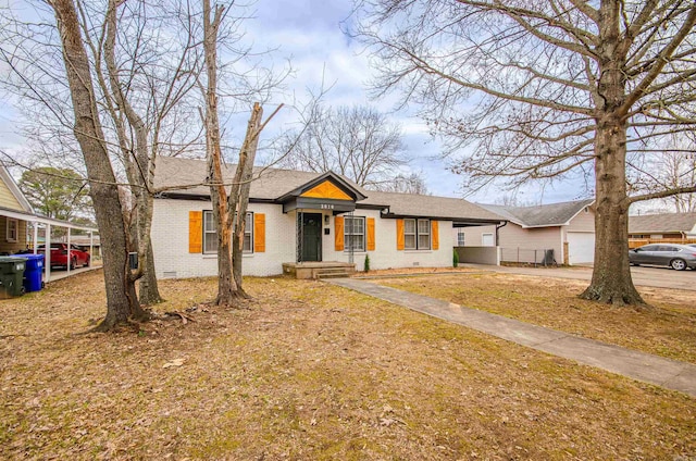 view of front of home with roof with shingles, an attached garage, and brick siding