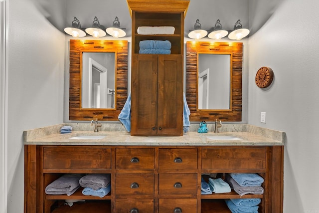 full bath featuring a sink and double vanity