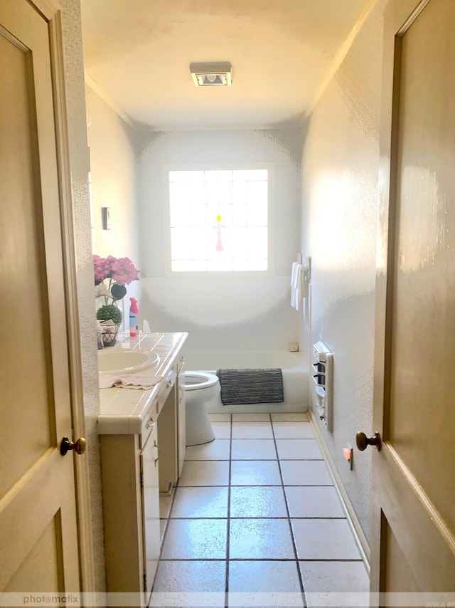 full bath featuring toilet, heating unit, tile patterned flooring, a bathtub, and vanity