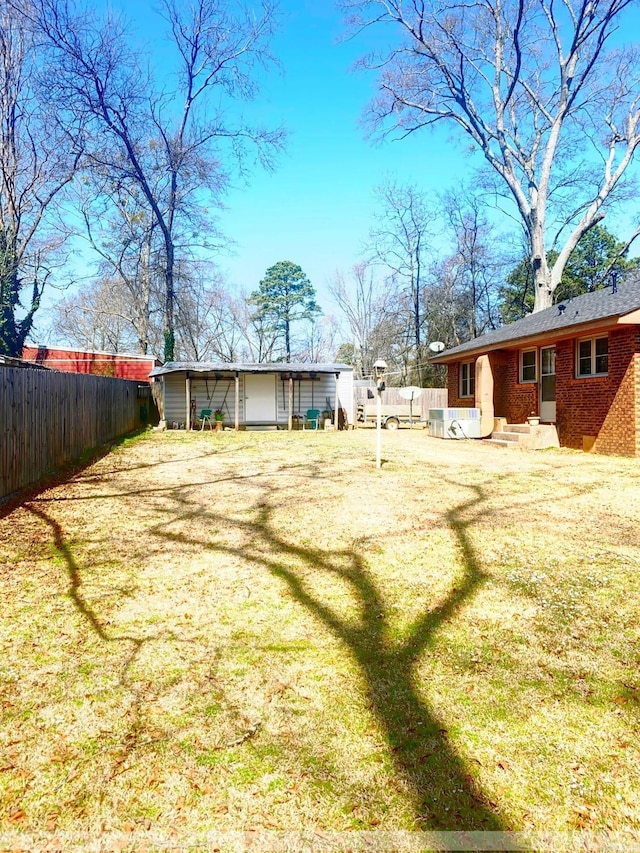 view of yard featuring fence