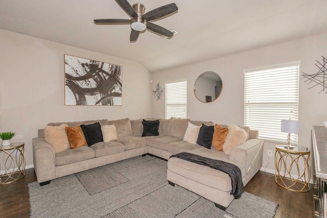 living room with vaulted ceiling, ceiling fan, baseboards, and wood finished floors